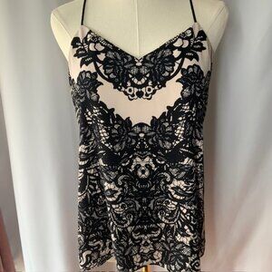 Express womens Size Small tank blouse with cream and black print